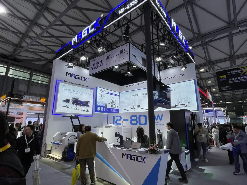 Panoramic view of Magick Laser booth N2-2332 displaying 12-80kW ultra-high power fiber laser cutting machines at Photonics China 2026.