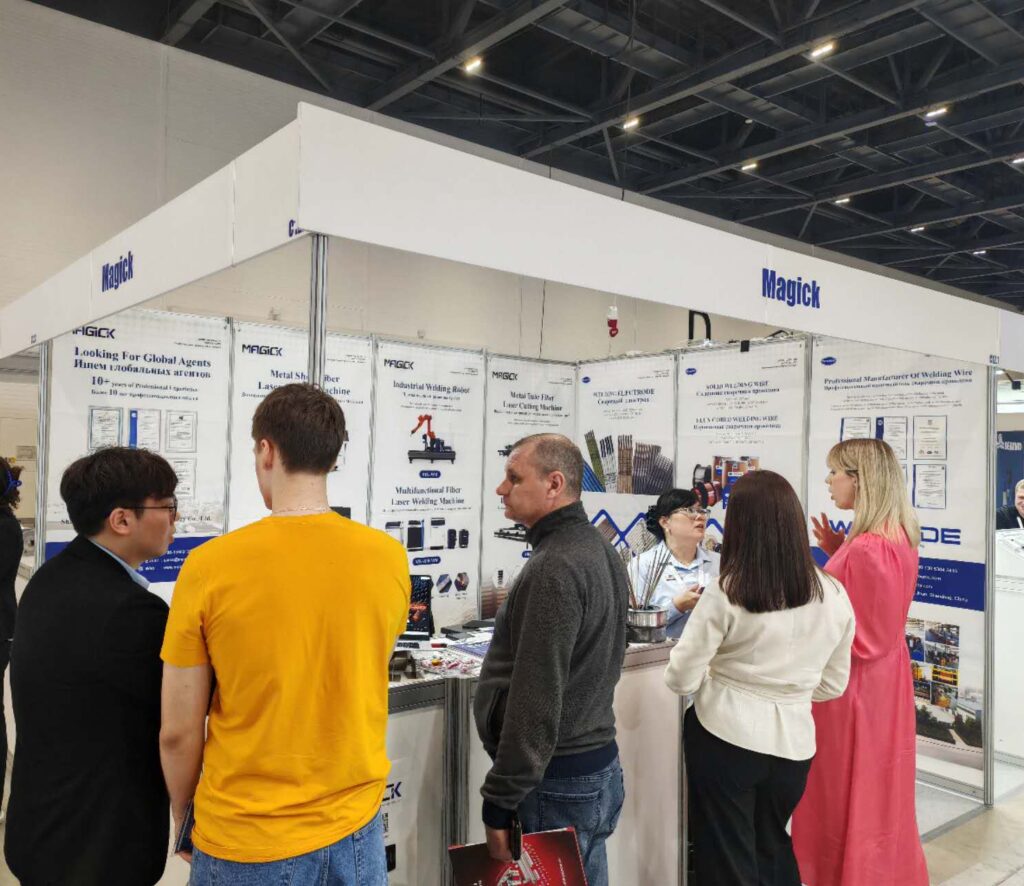 MAGICK representatives providing customized industrial laser solutions to global manufacturing enterprise leaders