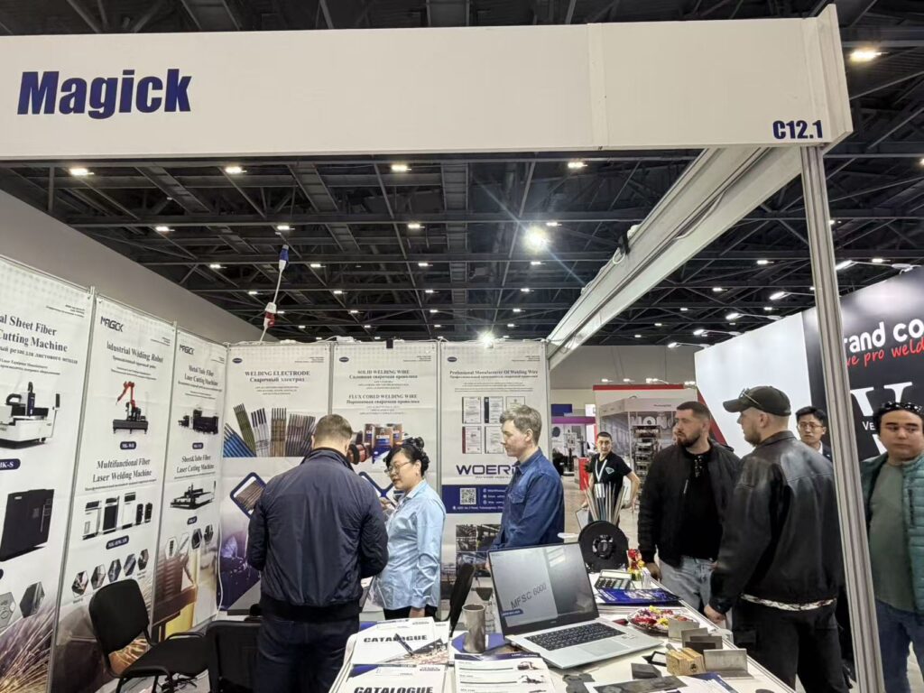 MAGICK laser equipment exhibition booth attracting international B2B clients at Kazakhstan industrial fair