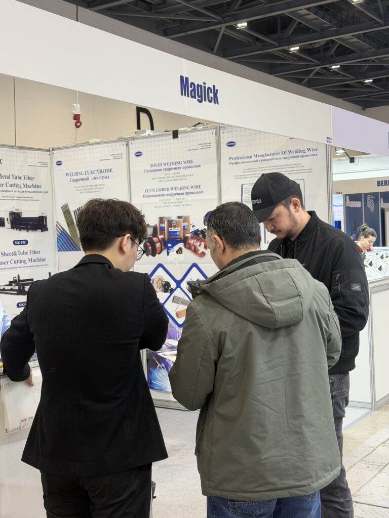 MAGICK engineering team explaining fiber laser cutting machine technical details to Central Asian distributors